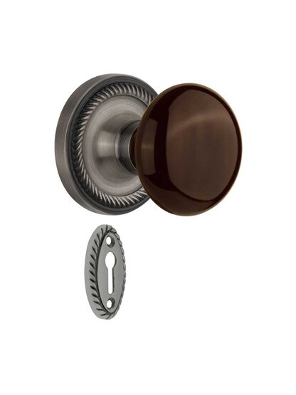 Rope Rosette Mortise-Lock Set with Brown Porcelain Knobs in Antique Pewter.